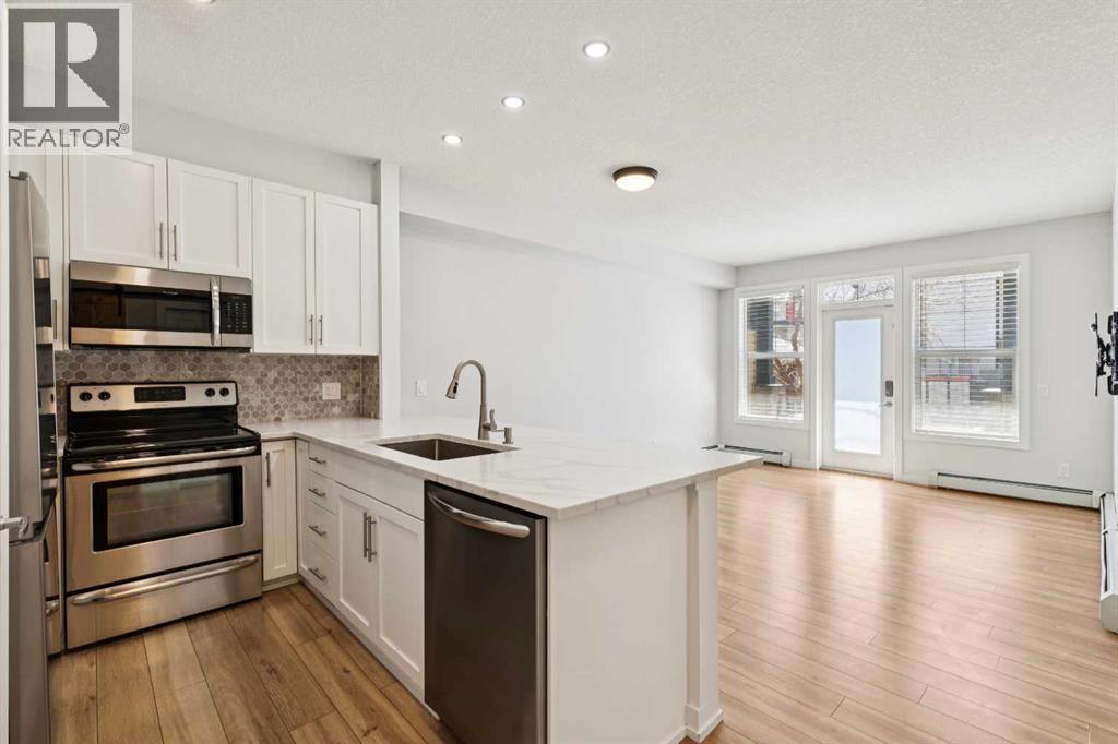 112, 10 Panatella Road NW, Calgary, Alberta  T3K 0V4 - Photo 3 - A2304815