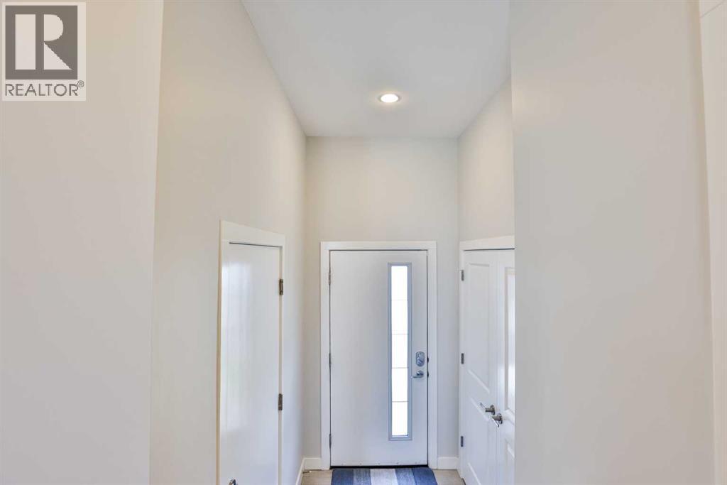 3, 65 Aquitania Circle W, Lethbridge, Alberta  T1J 5M5 - Photo 2 - A2310696