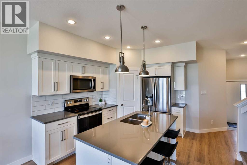 3, 65 Aquitania Circle W, Lethbridge, Alberta  T1J 5M5 - Photo 5 - A2310696