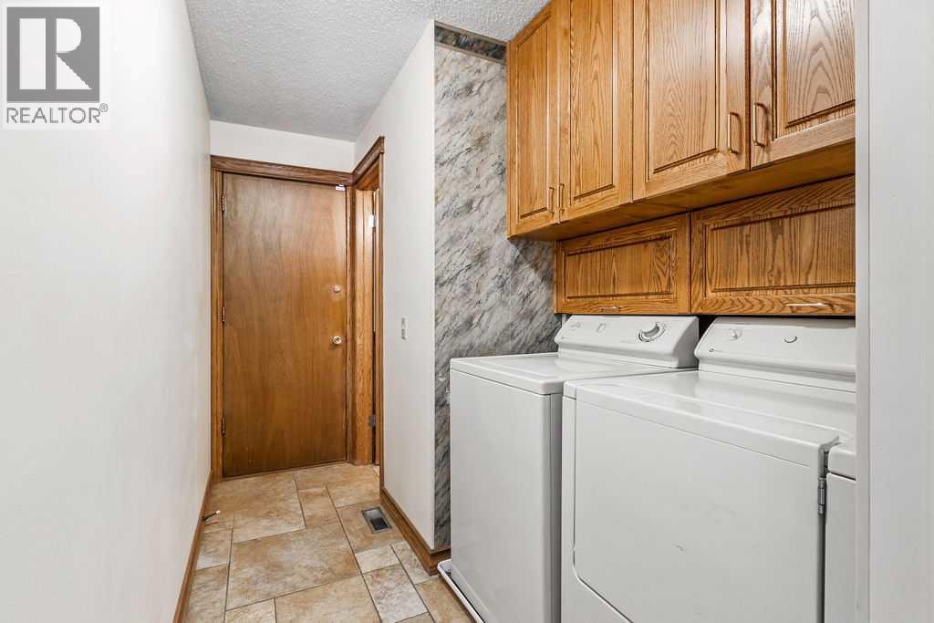 652 Dalmeny Hill Nw, Calgary, Alberta  T3A 1T6 - Photo 19 - A2311707