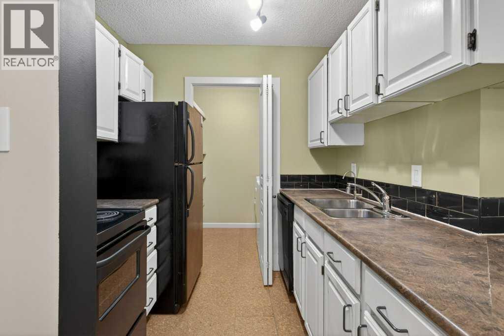 113, 6400 Coach Hill Road SW, Calgary, Alberta  T3H 1B8 - Photo 11 - A2311921
