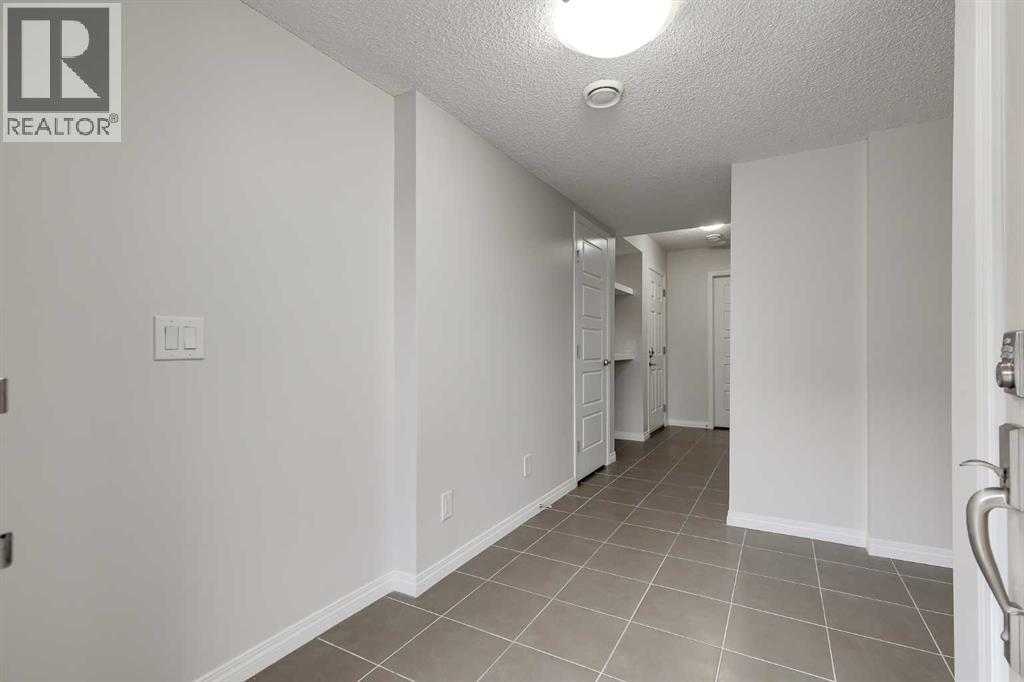 160 Windford Gardens SW, Airdrie, Alberta  T4B 4A6 - Photo 3 - A2303833