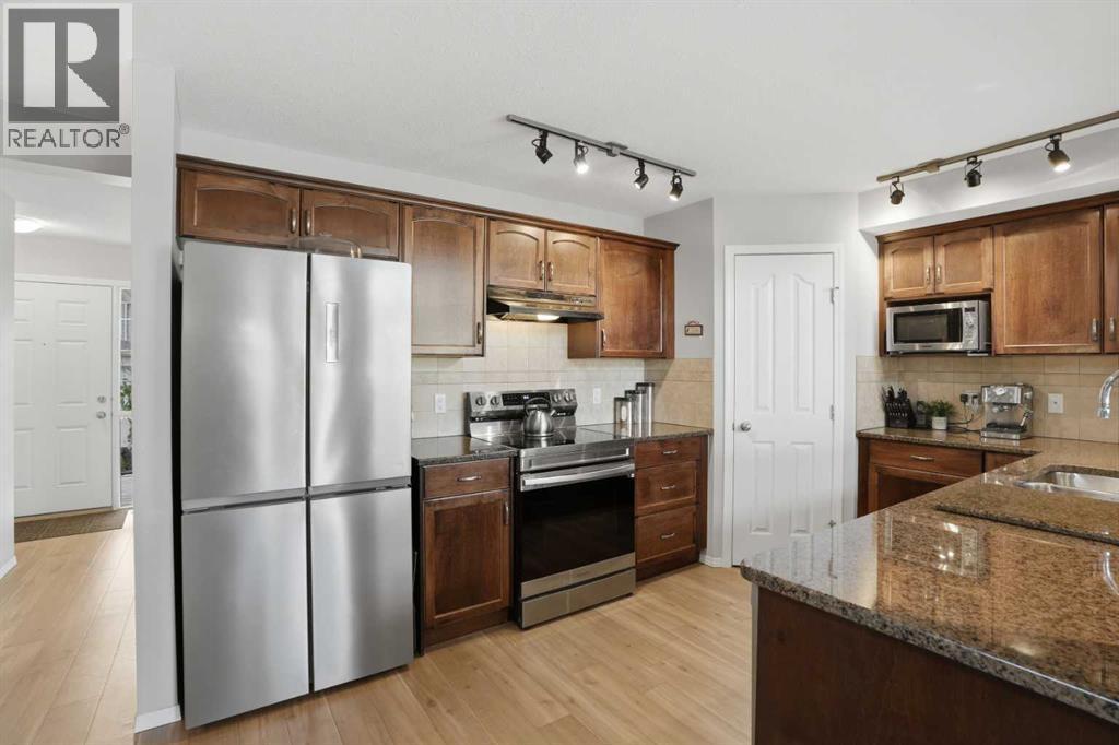 87 Bridlecrest Road SW, Calgary, Alberta  T2Y 5J2 - Photo 8 - A2310166