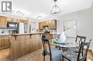 105 Cimarron Park Circle, Okotoks, Alberta  T1S 2H5 - Photo 23 - A2311097