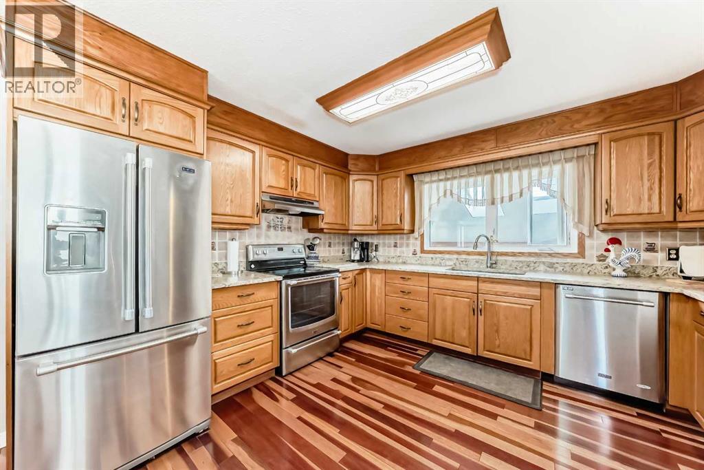 247 Huntford Way NE, Calgary, Alberta  T2K 3Z9 - Photo 3 - A2309815