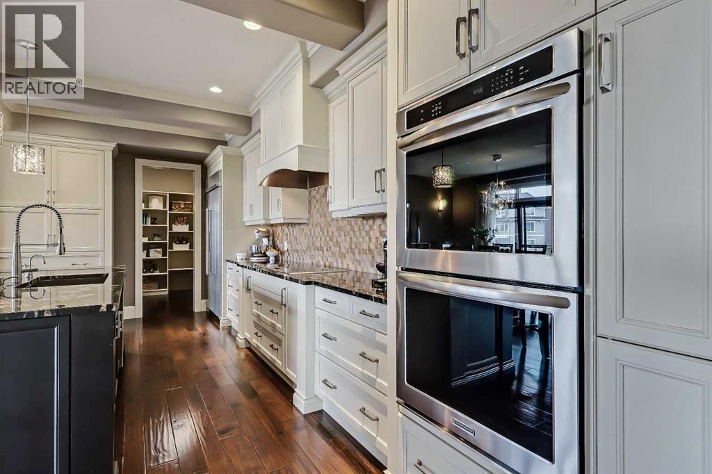 85 Rockcliff Heights NW, Calgary, Alberta  T3G 0C7 - Photo 12 - A2311582