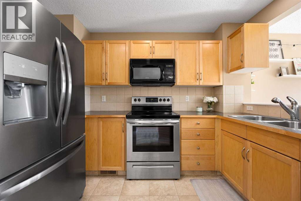 133 Luxstone Way SW, Airdrie, Alberta  T4B 3C2 - Photo 11 - A2310612