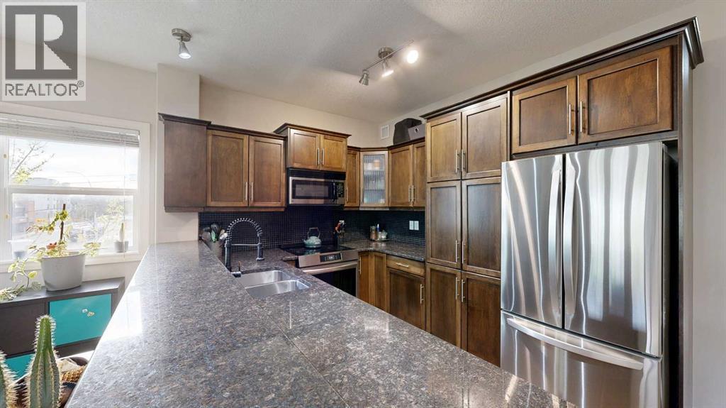 301, 110 12 Avenue NE, Calgary, Alberta  T2E 0Z9 - Photo 9 - A2311024
