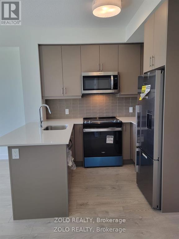 909 - 3220 William Coltson Avenue, Oakville, Ontario  L6H 7C2 - Photo 5 - W13147098
