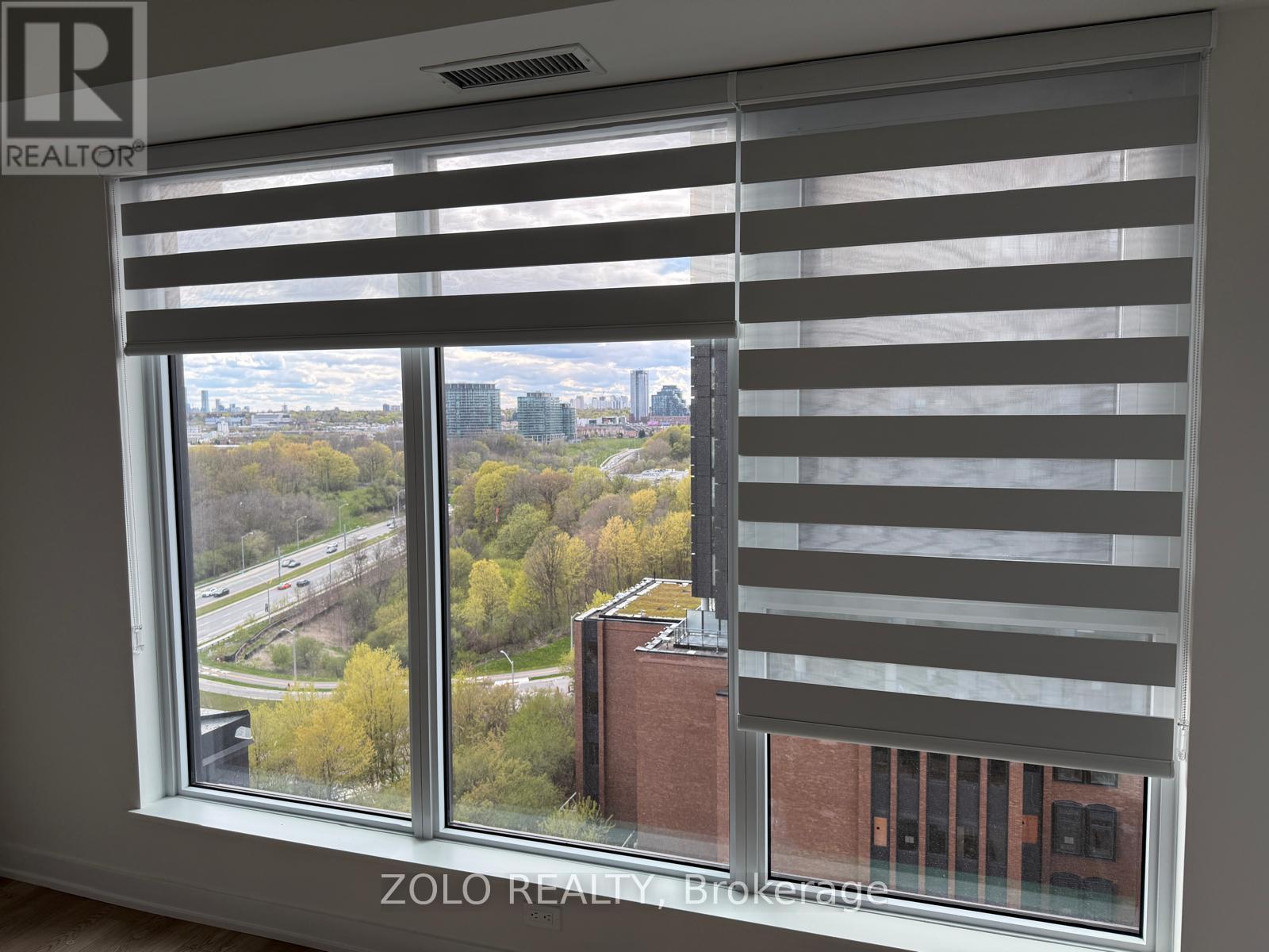 1002 - 5 Quarrington Lane, Toronto, Ontario M3C 0S4 - Photo 4 - C12987818