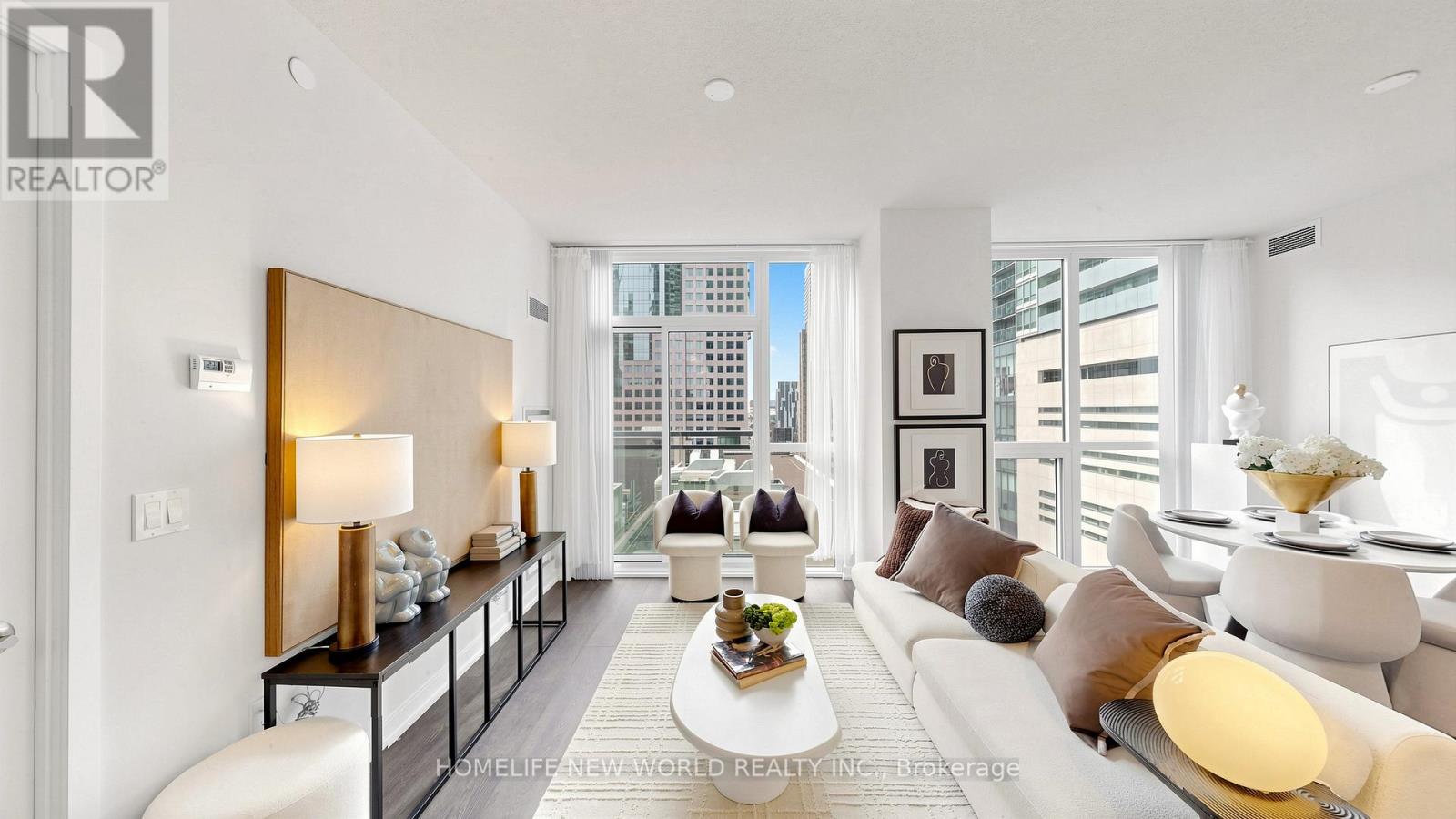 <div class="slider-price">$928,800</div><p>703 - 99 John Street, Toronto, Ontario</p>