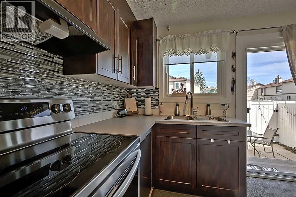 72 Deerpoint Road Se, Calgary, Alberta  T2J 6M9 - Photo 3 - A2311045