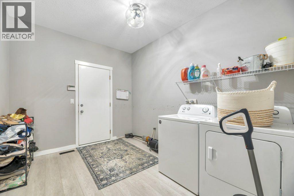 712 East Chestermere Drive, Chestermere, Alberta  T1X 1A5 - Photo 24 - A2309919