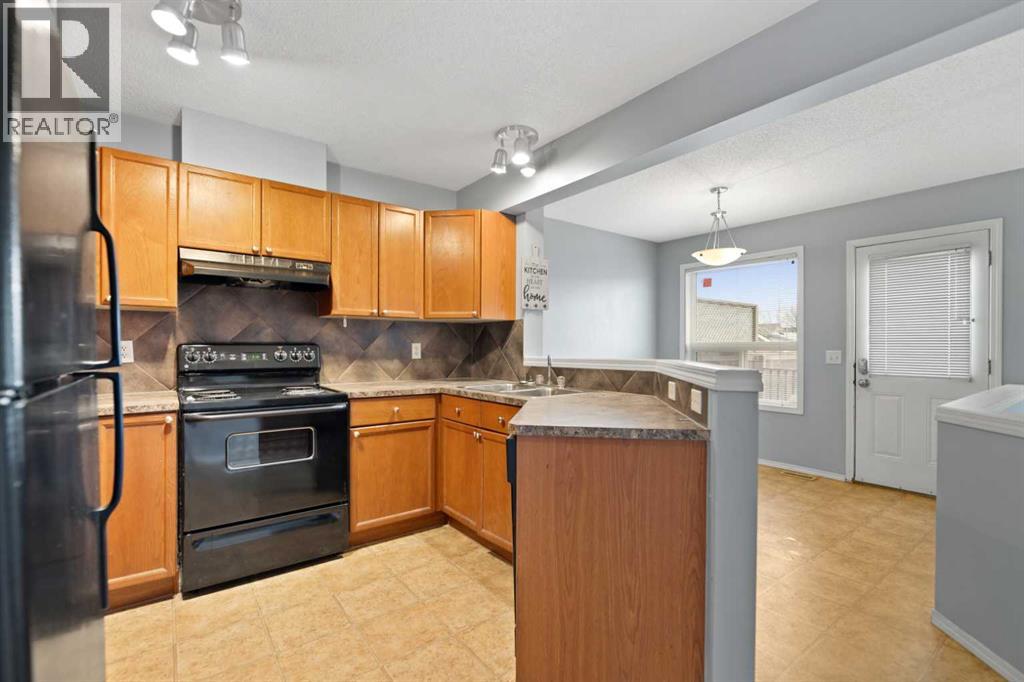 116 Saddlebrook Common NE, Calgary, Alberta  T3J 5M4 - Photo 10 - A2302339