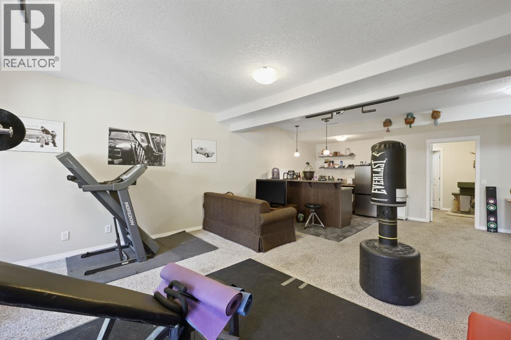 56 Jumping Pound Rise, Cochrane, Alberta  T4C 0K6 - Photo 37 - A2282578