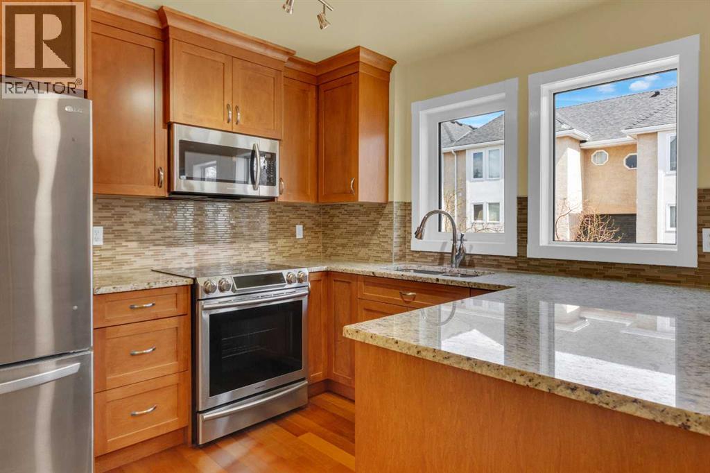87 Candle Terrace SW, Calgary, Alberta  T2W 6G7 - Photo 9 - A2297042