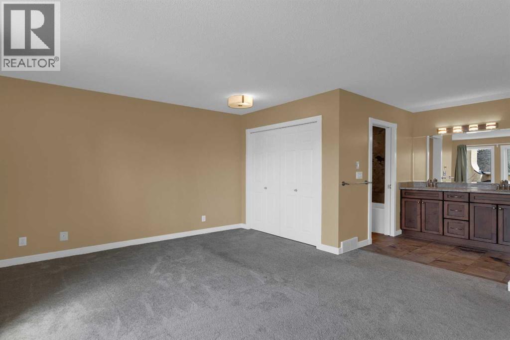 87 Candle Terrace SW, Calgary, Alberta  T2W 6G7 - Photo 19 - A2297042