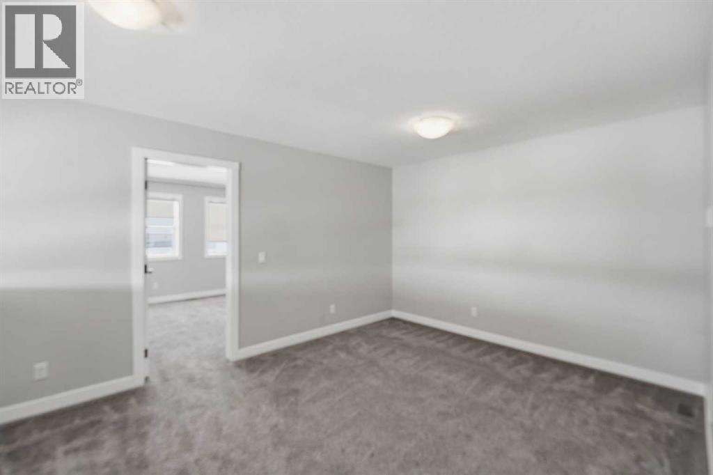 125 Edith Gate NW, Calgary, Alberta  T3R 1Z2 - Photo 19 - A2295954