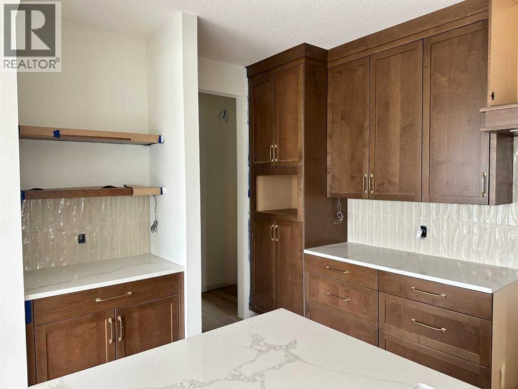 460 Discovery Place SW, Calgary, Alberta  T3H 6A2 - Photo 11 - A2300011