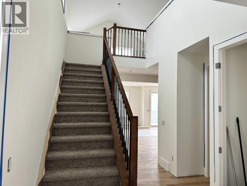 460 Discovery Place SW, Calgary, Alberta  T3H 6A2 - Photo 7 - A2300011