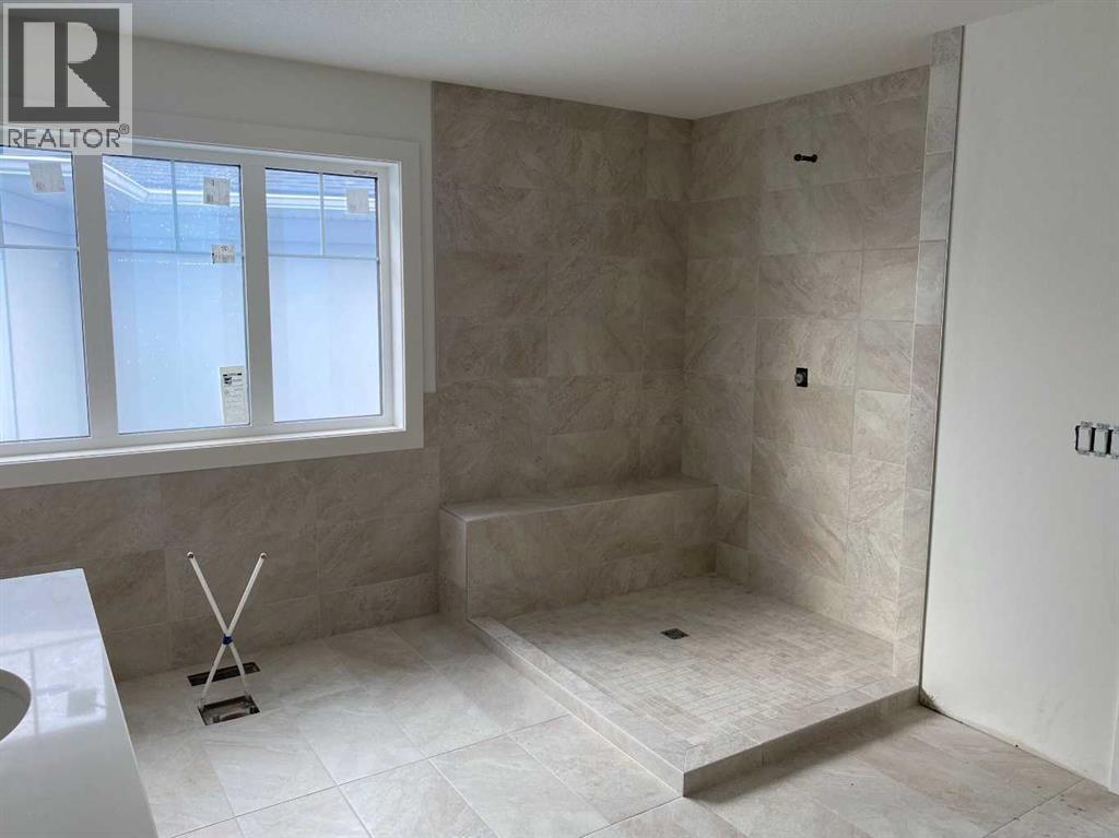 460 Discovery Place SW, Calgary, Alberta  T3H 6A2 - Photo 19 - A2300011