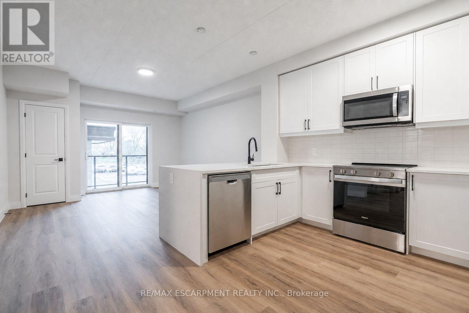 201 - 6415 Regional Road 25, Milton, Ontario  L9T 8R2 - Photo 2 - W13150258