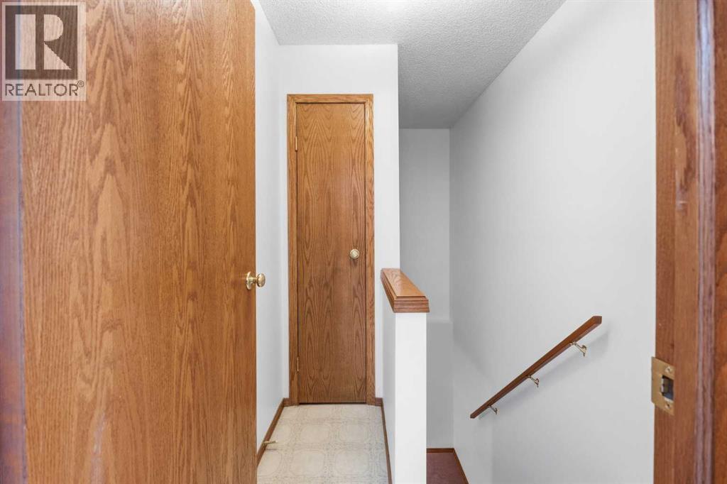 12 Arbour Cliff Close NW, Calgary, Alberta  T3G 3W8 - Photo 13 - A2276284