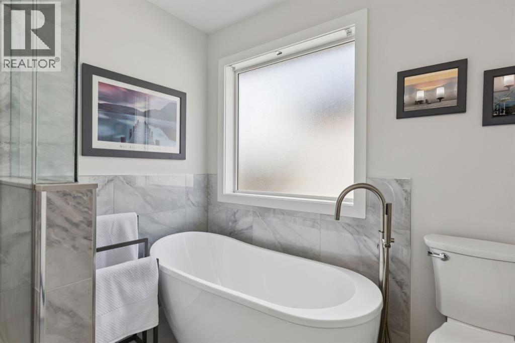 65 Cougarstone Terrace SW, Calgary, Alberta  T3H 5A1 - Photo 23 - A2307925