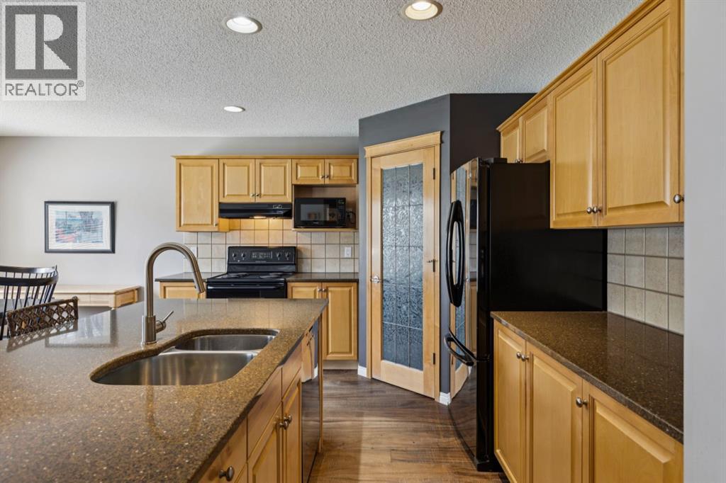 65 Cougarstone Terrace SW, Calgary, Alberta  T3H 5A1 - Photo 8 - A2307925