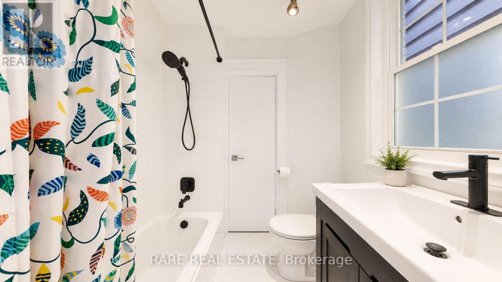 48 Redwood Avenue, Toronto, Ontario  M4L 2S6 - Photo 11 - E13150632