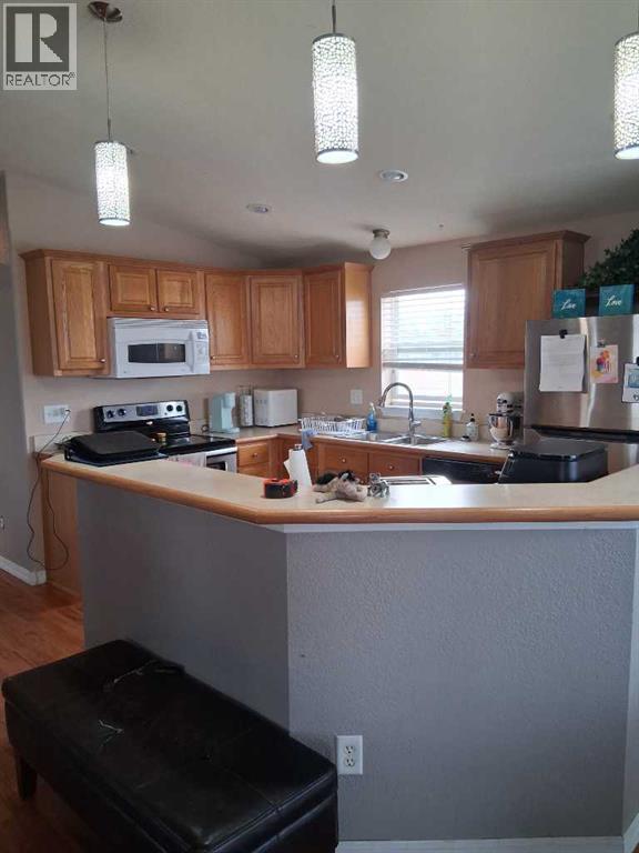 414 Conductor Boulevard, Coaldale, Alberta  T1M 1P8 - Photo 3 - A2286773
