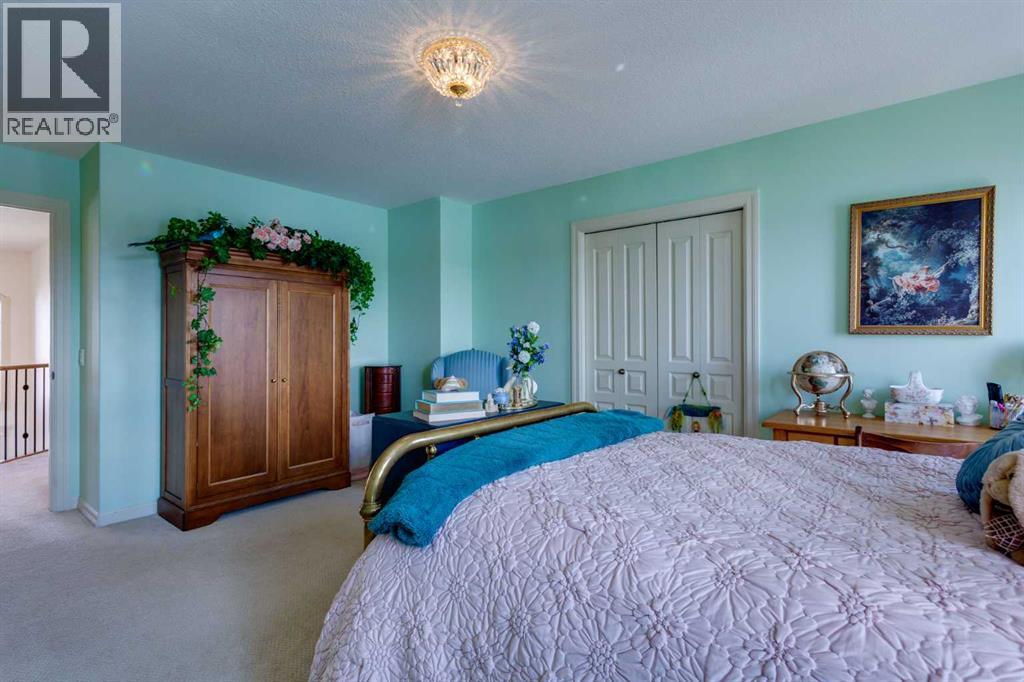 210 Crystal Shores Drive, Okotoks, Alberta  T1S 2C5 - Photo 33 - A2305970