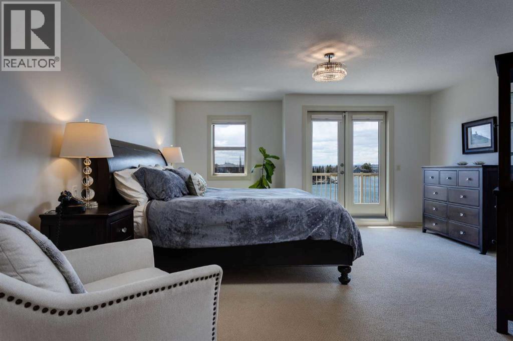 210 Crystal Shores Drive, Okotoks, Alberta  T1S 2C5 - Photo 26 - A2305970