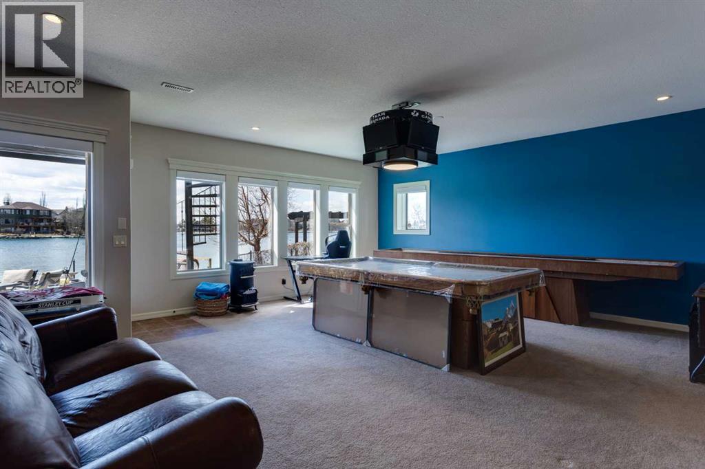 210 Crystal Shores Drive, Okotoks, Alberta  T1S 2C5 - Photo 39 - A2305970