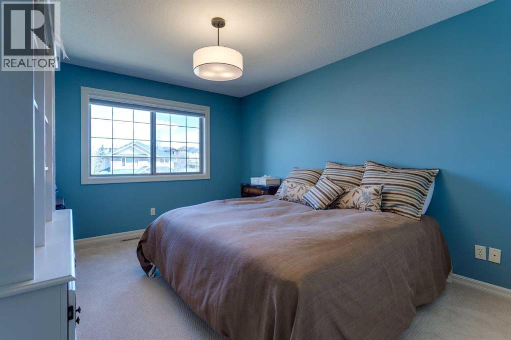 210 Crystal Shores Drive, Okotoks, Alberta  T1S 2C5 - Photo 34 - A2305970
