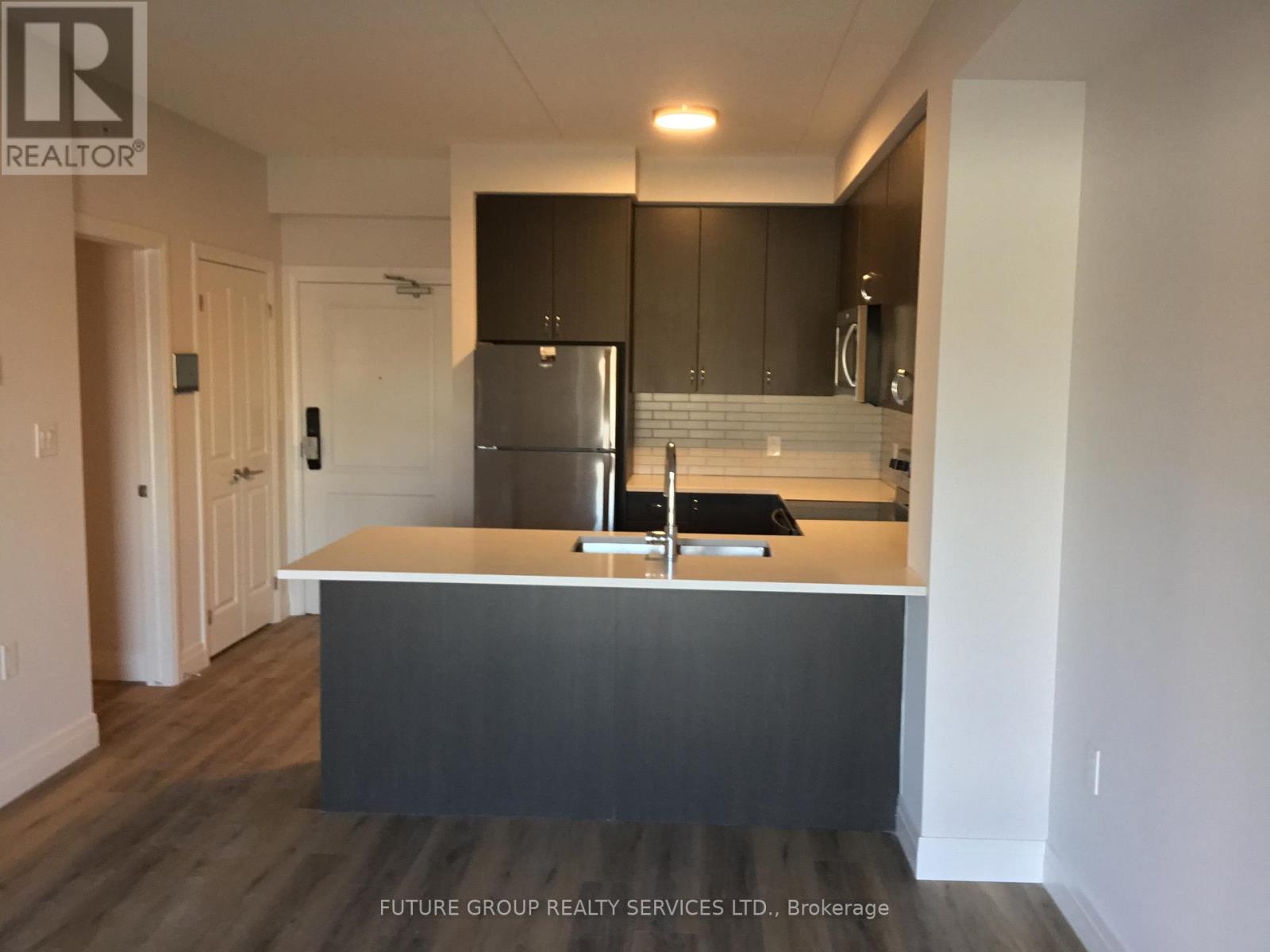 203 - 6415 Regional Rd 25, Milton, Ontario L9T 2W3 - Photo 2 - W13150960