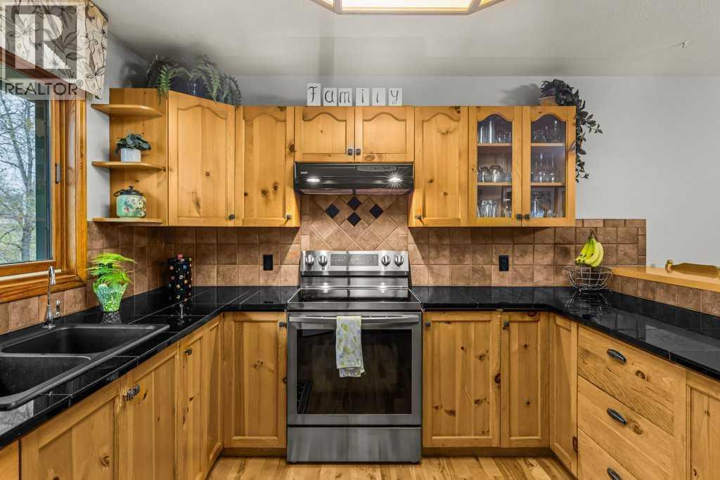 146 Cougar Point Road, Canmore, Alberta  T1W 1A1 - Photo 15 - A2312969