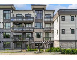 214 9983 E BARNSTON DRIVE, Surrey, British Columbia