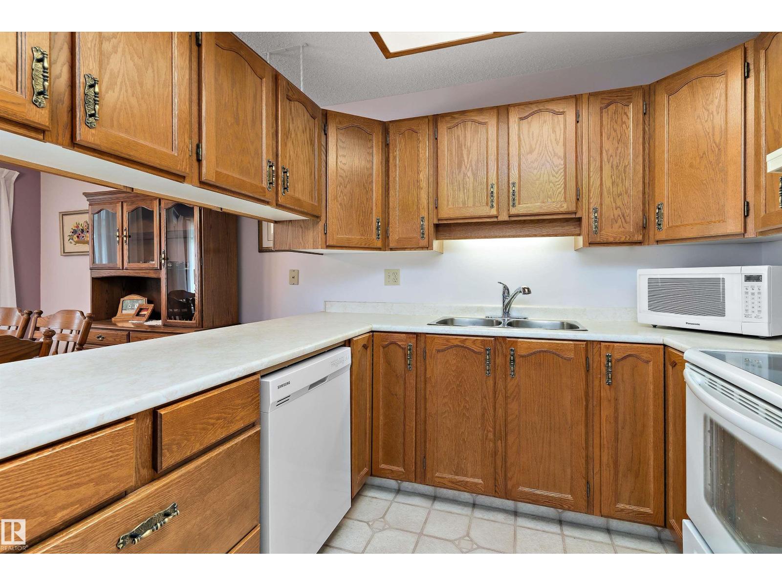 17404 Callingwood Rd Nw, Edmonton, Alberta  T5T 5P1 - Photo 5 - E4488827