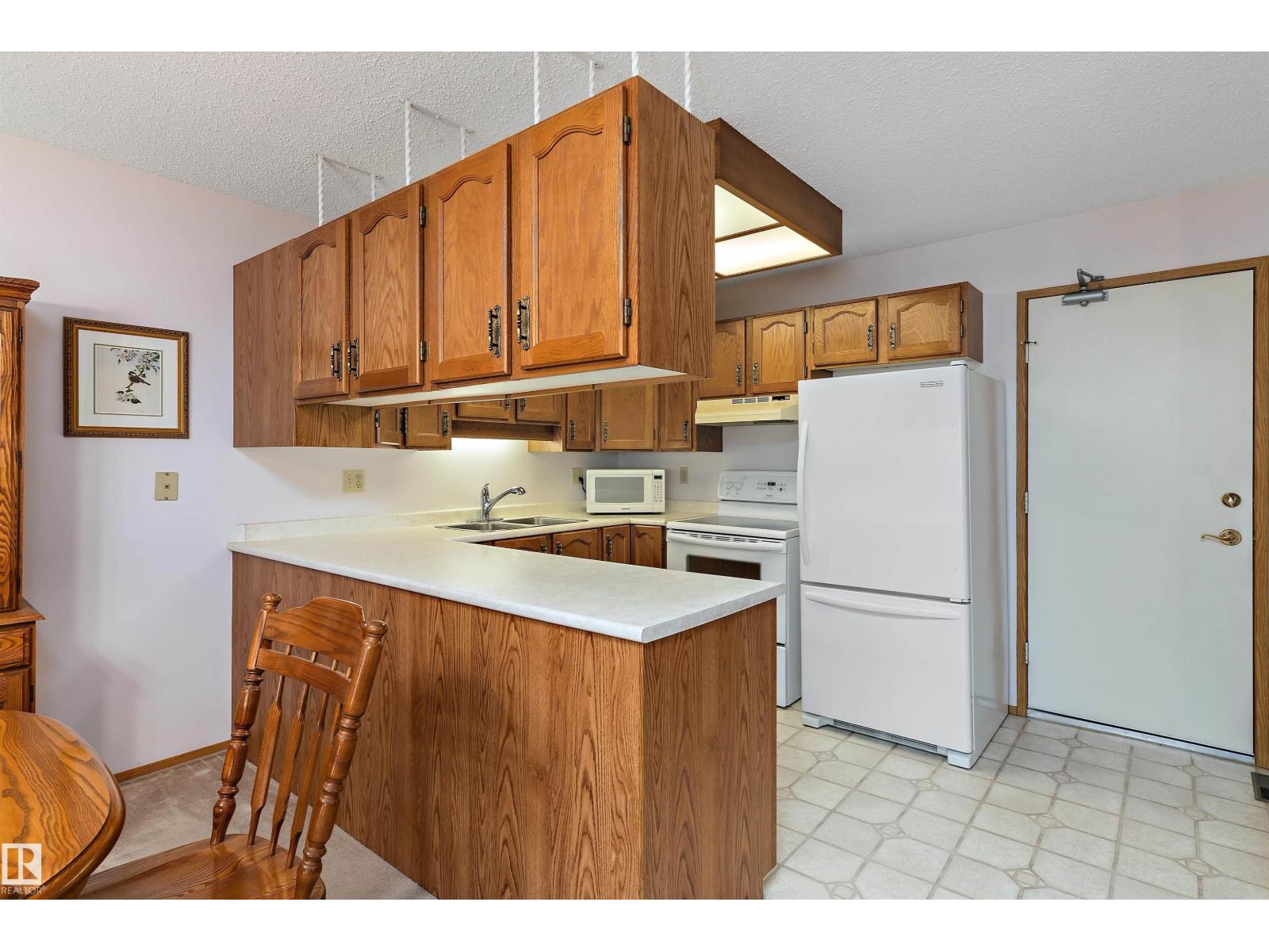 17404 Callingwood Rd Nw, Edmonton, Alberta  T5T 5P1 - Photo 6 - E4488827