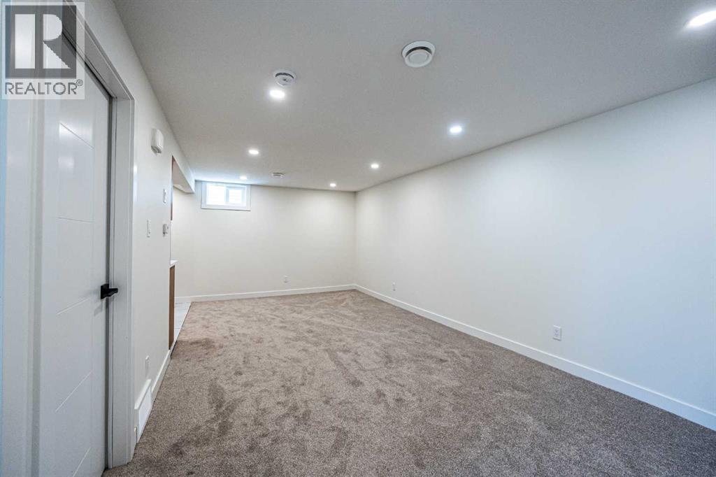 176 Huntchester Crescent NE, Calgary, Alberta  T2K 5E9 - Photo 30 - A2311767