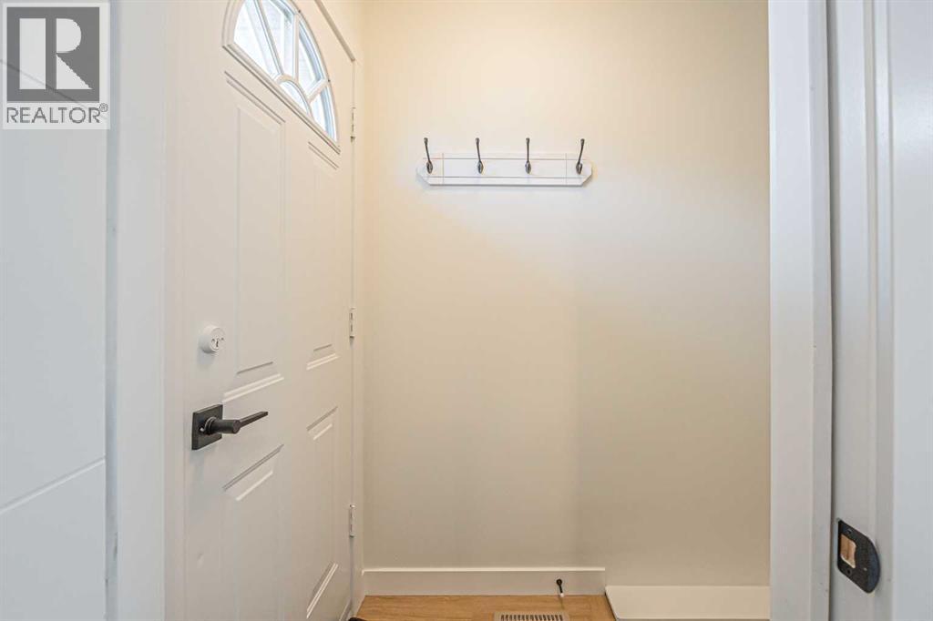 176 Huntchester Crescent NE, Calgary, Alberta  T2K 5E9 - Photo 6 - A2311767