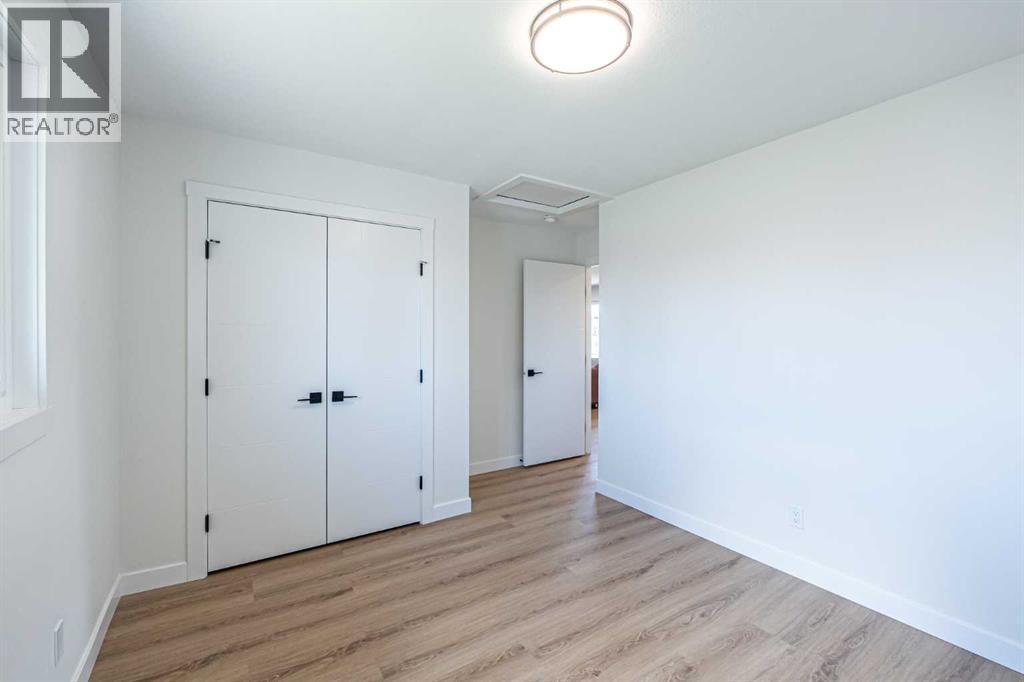 176 Huntchester Crescent NE, Calgary, Alberta  T2K 5E9 - Photo 26 - A2311767
