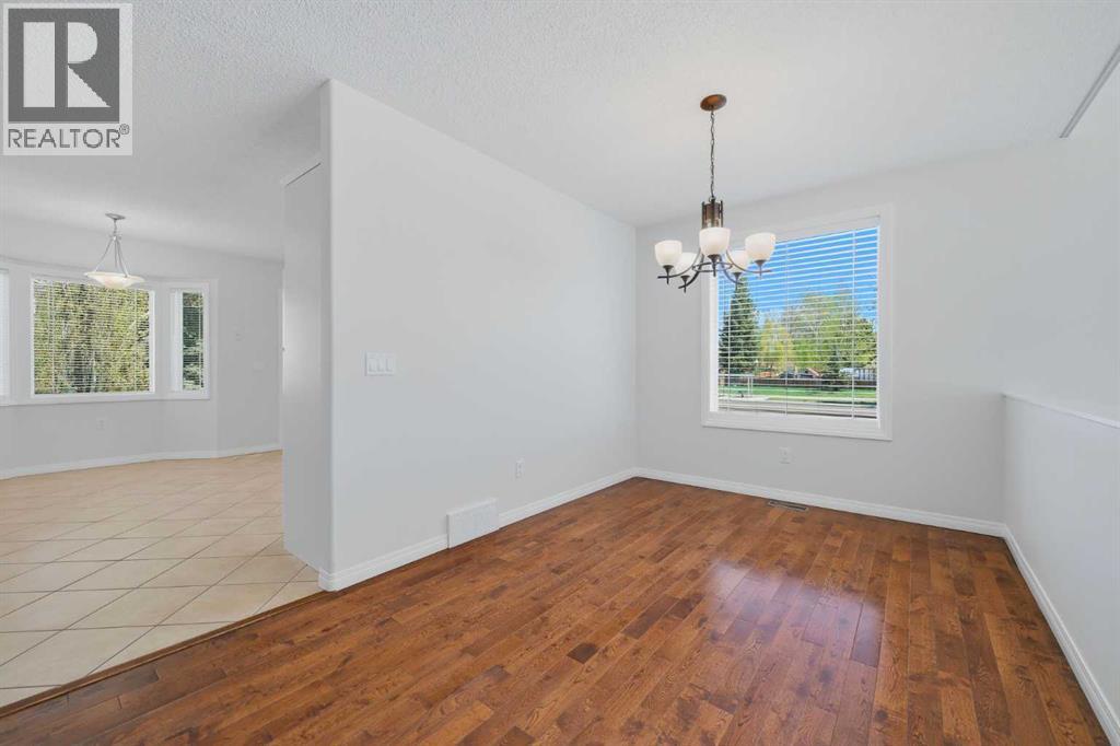 4 Woodstock Road SW, Calgary, Alberta  T2W 5V8 - Photo 7 - A2312247