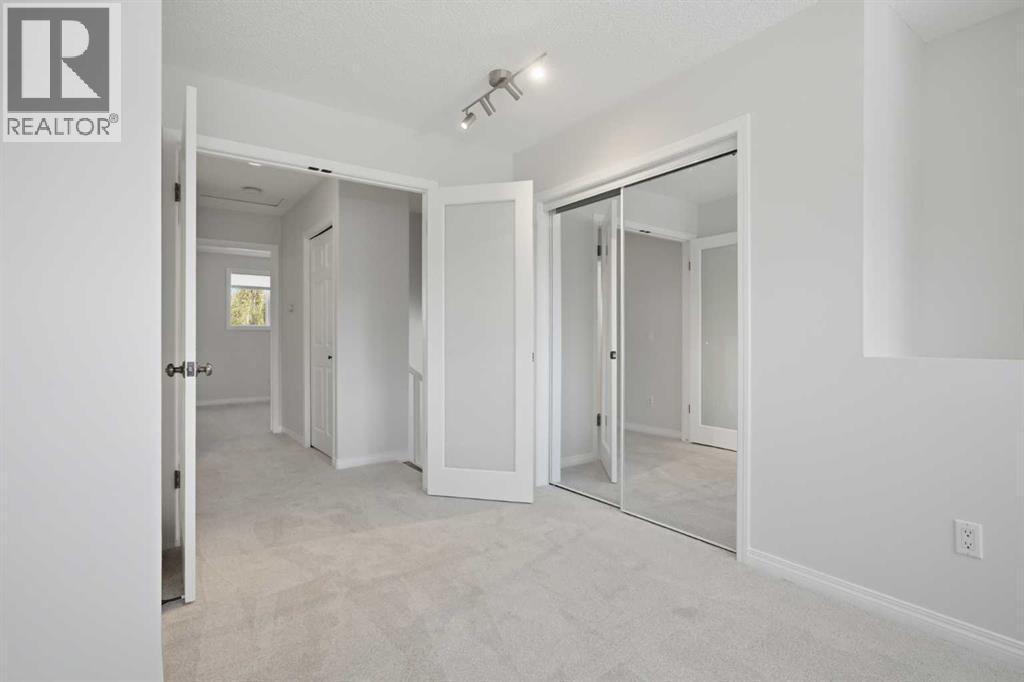 4 Woodstock Road SW, Calgary, Alberta  T2W 5V8 - Photo 23 - A2312247