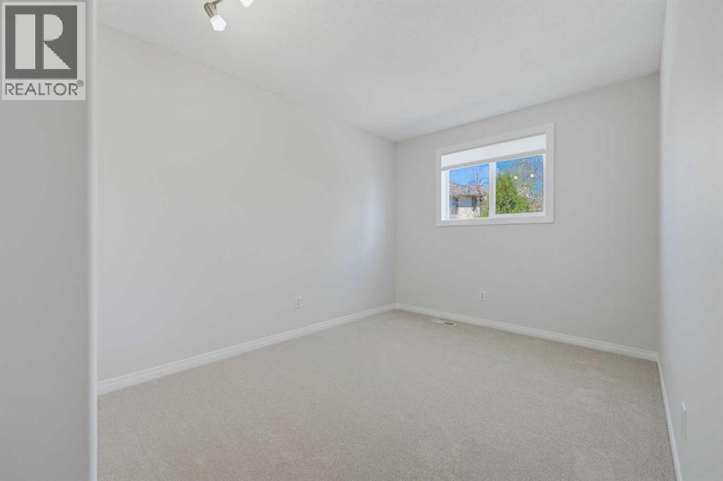 4 Woodstock Road SW, Calgary, Alberta  T2W 5V8 - Photo 28 - A2312247