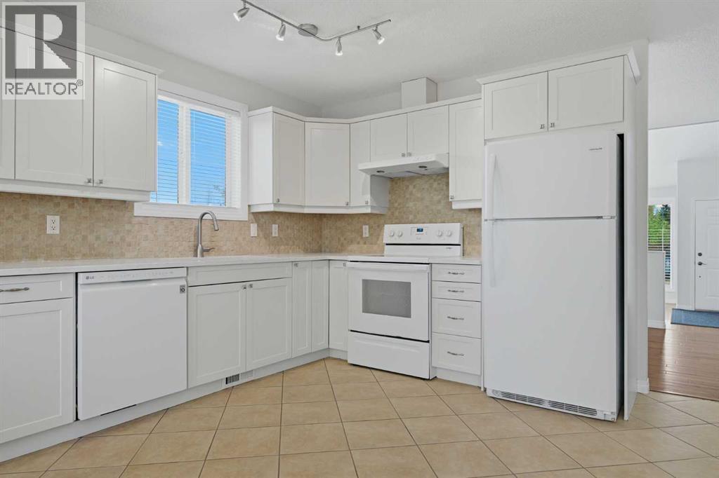 4 Woodstock Road SW, Calgary, Alberta  T2W 5V8 - Photo 10 - A2312247