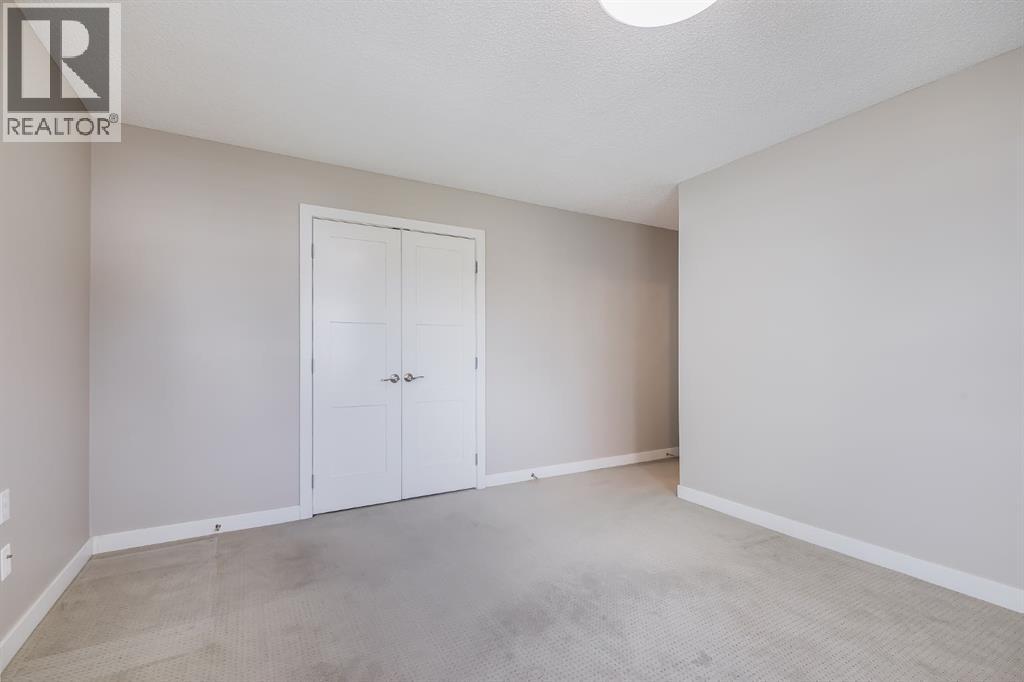 512 Woodside Drive NW, Airdrie, Alberta  T4B 2C6 - Photo 18 - A2308172