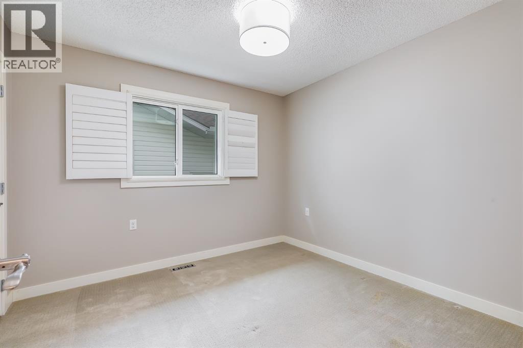 512 Woodside Drive NW, Airdrie, Alberta  T4B 2C6 - Photo 20 - A2308172