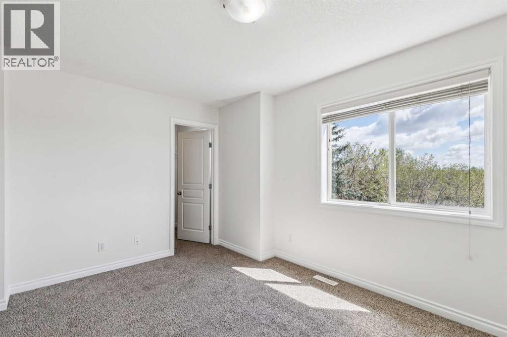 86 Crystal Shores Cove, Okotoks, Alberta  T1S 2B4 - Photo 23 - A2312641